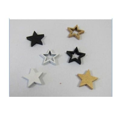 confettis de table en bois représentant des étoiles pour noel | jourdefete.com